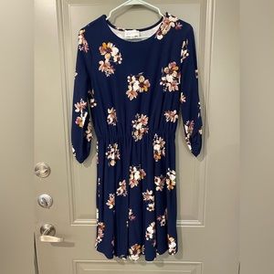Navy floral patterned 3/4 length sleeve dress, knee length